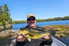 Guest Catching a Trophy Smallmouth Bass