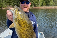 Remote Fly-In Bass Fishing Catch