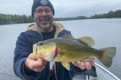 Smiling Man with Healthy Smallmouth Bass