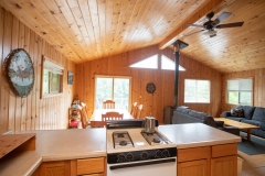 Kitchen Island And Living Space At Fly-In Cabin