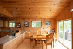 Dining Area Beside Kitchen At Remote Cabin