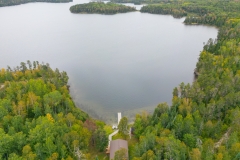 Wide Aerial Of Loonhaunt Lake And Shoreline