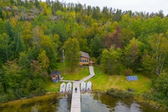 Dock And Shoreline At Loonhaunt Lake Cabin