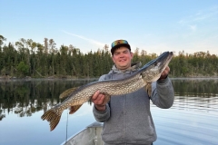 Evening Muskie Catch on Glass-Calm Water