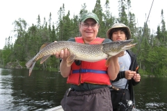 Two Anglers Showing a Heavy Pike Catch