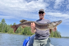 Wide Trophy Pike Presented on Blue Lake