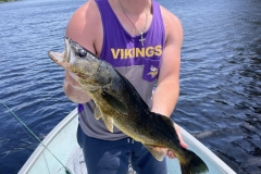 Young Angler with Golden Walleye on Remote Ontario Lake